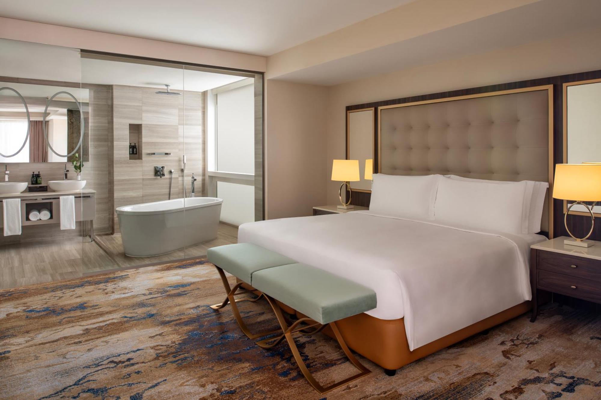 Dusit Doha Hotel Exterior foto A bedroom at the hotel